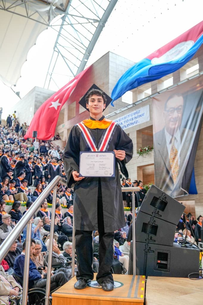 Receiving diploma from professor at Bilkent University