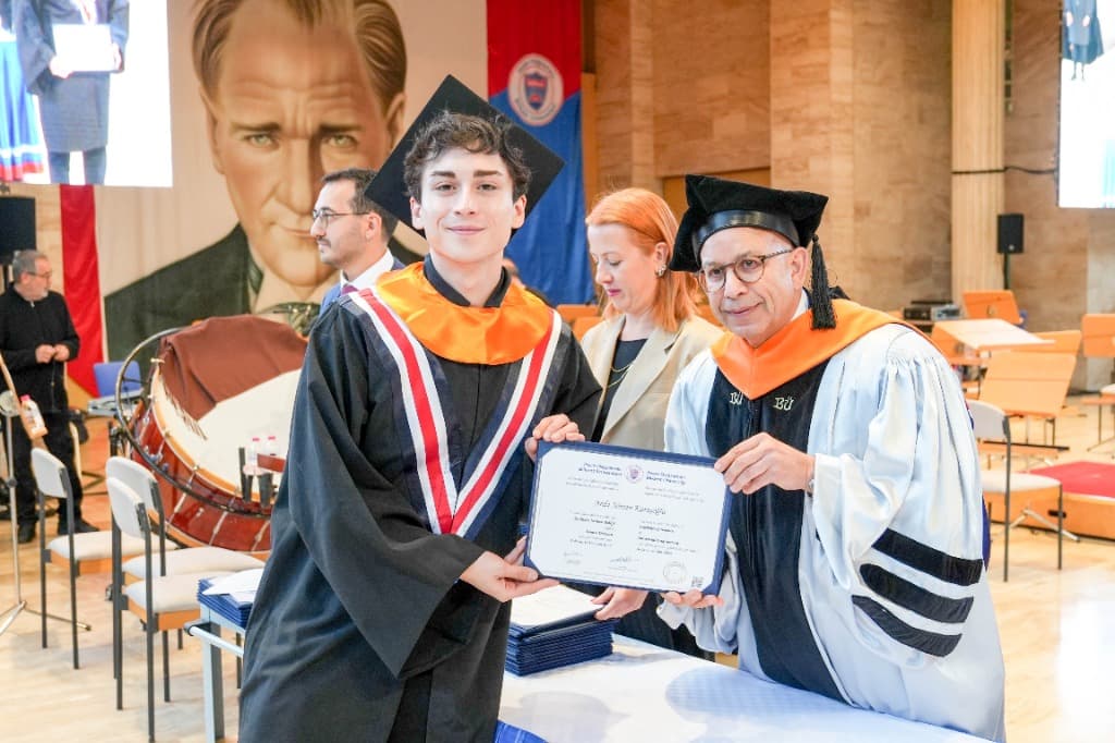 Arda on stage at the Bilkent University graduation ceremony